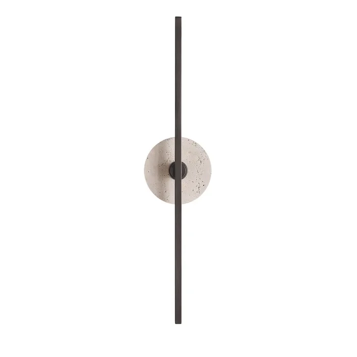 “Essential Stick” in Bronze and Travertine