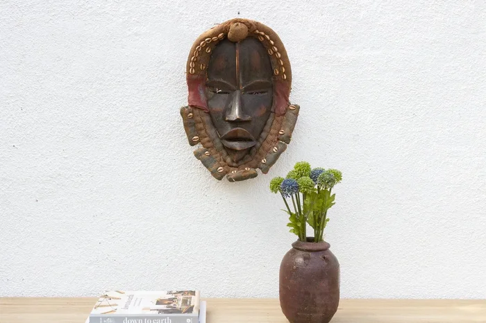 Enigmatic African Mask Wall art with Cowrie Shells